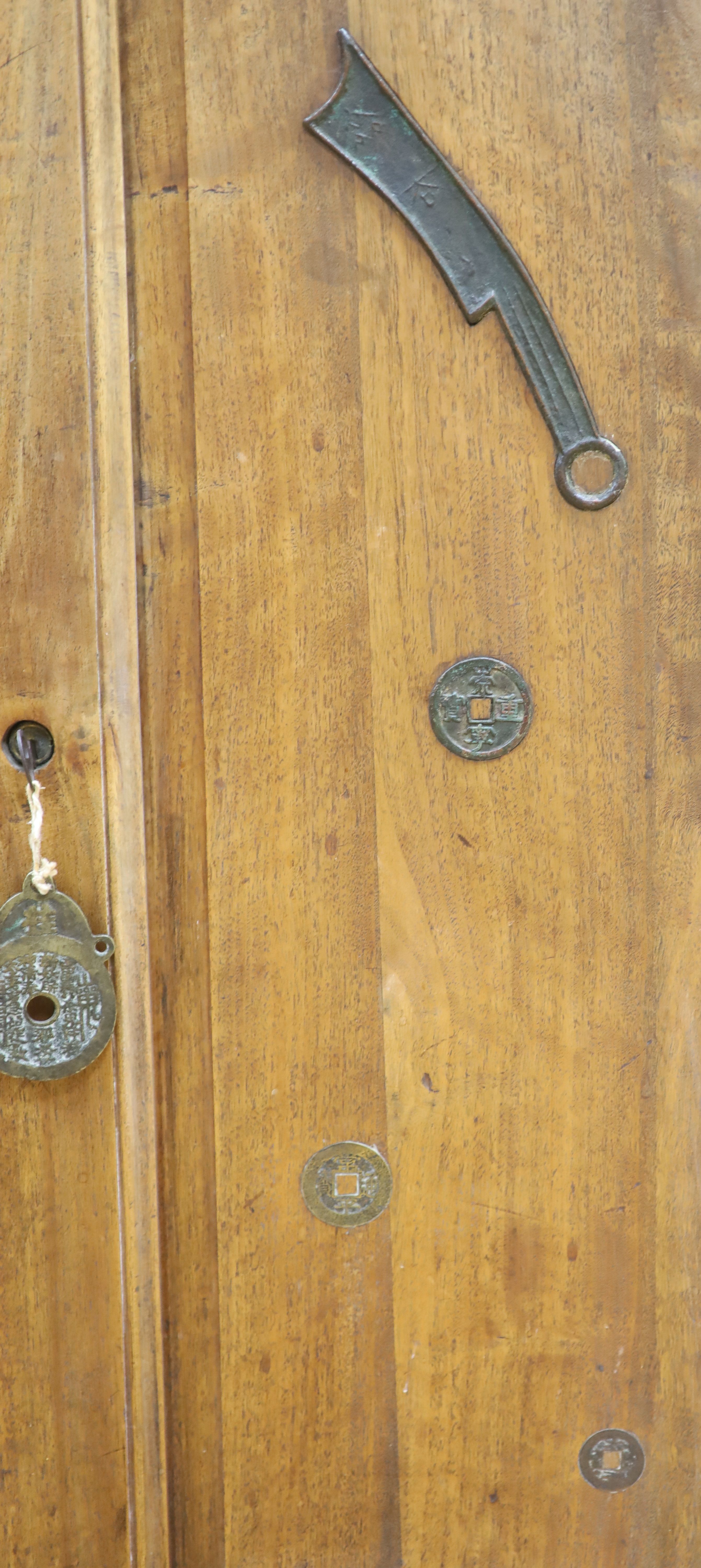 A walnut collectors cabinet for Chinese and Asian amulets and coins, early 20th century,